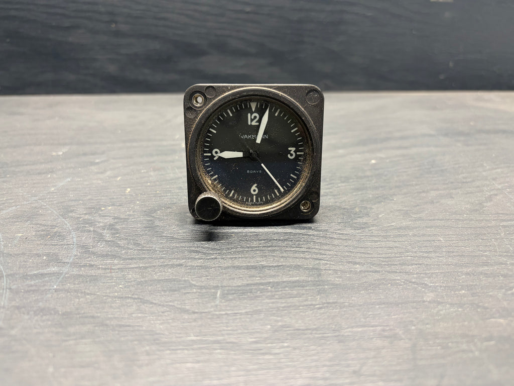 Wakmann 8-day aircraft panel clock.